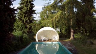 pop up garden igloo at the end of swimming pool