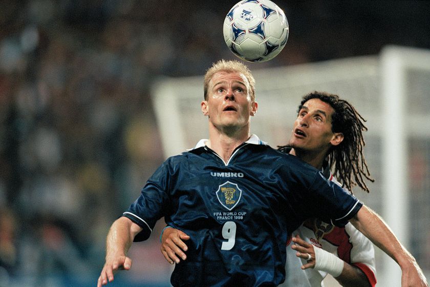 Scotland&#039;s Gordon Durie (L) and Morocco&#039;s Smahi Triki during the 1998 soccer World Cup. | Location: St.-Etienne, France.