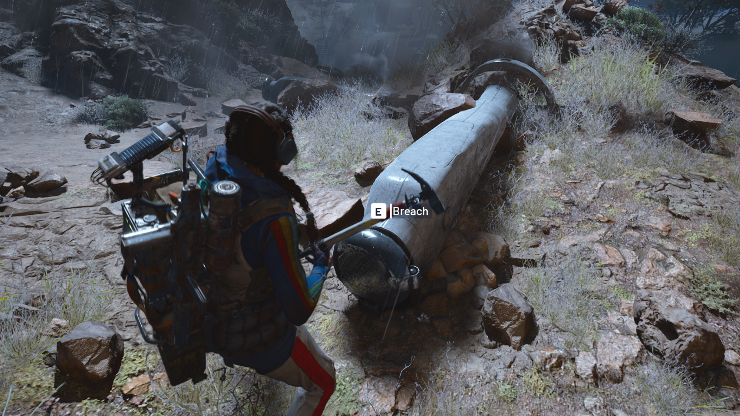 Arc Raiders ARC Probes and Couriers: A player about to breach a crashed ARC Probe on a rocky hillside at night.