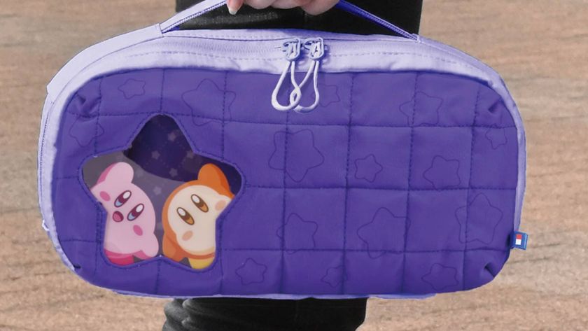 Official marketing photo showing someone holding a Hori Kirby and Waddle Dee Switch 2 case.