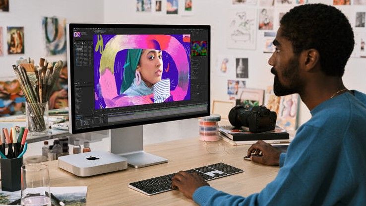 The Mac mini M2/M2 Pro on a desk with an Apple Studio display