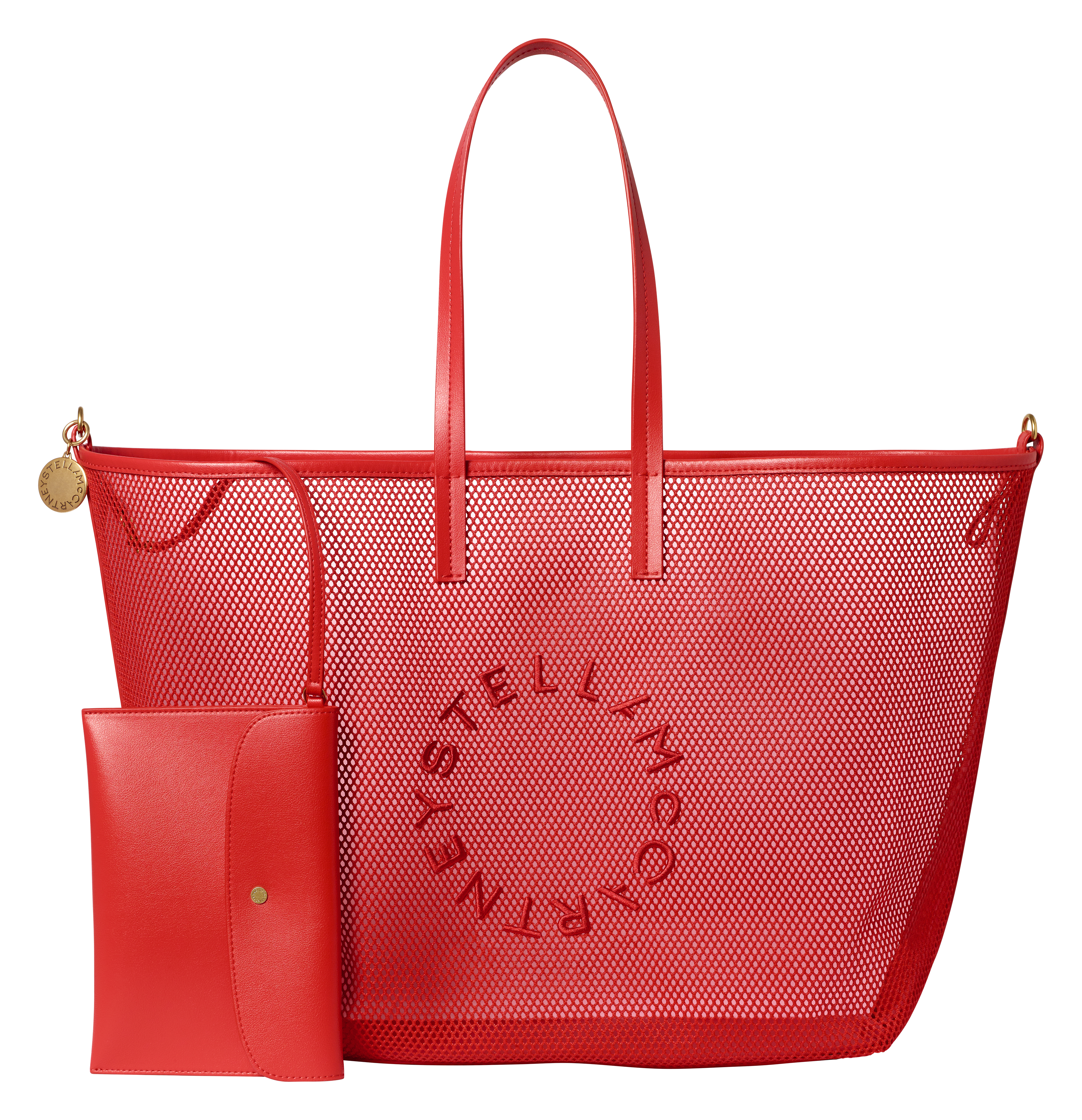 clothes from the H&M x Stella McCartney collaboration on a plain backdrop