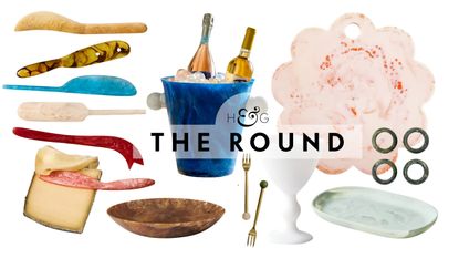 Resin tableware, including a set of cheese knives, chip-and-dip server, ice bucket, tray, set of napkin rings, sculptural goblet, and tricolor vase, pictured against a white background
