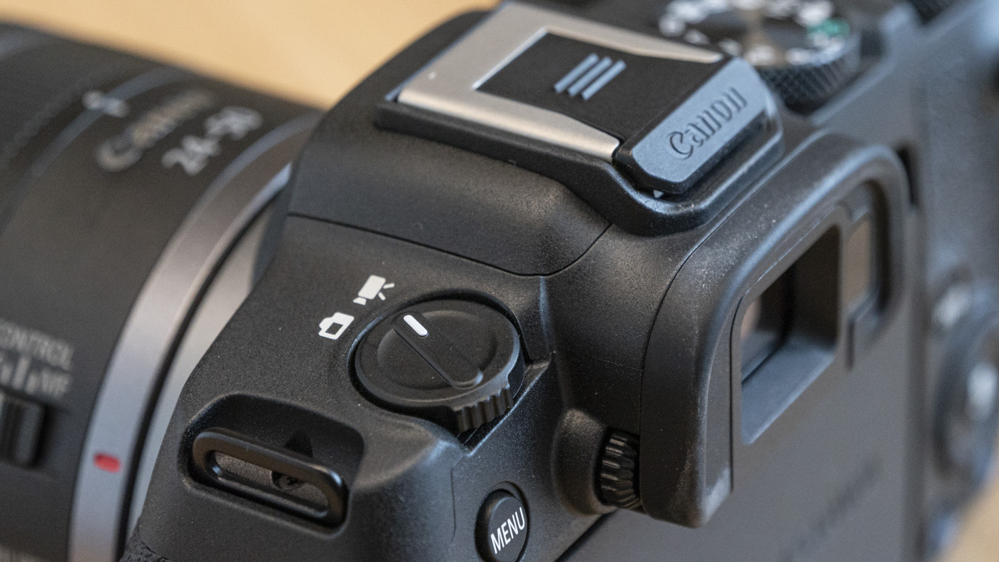 Canon EOS R8 close-up with video photo switch on table