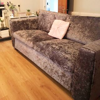 velvet sofa with brown colour and wooden flooring