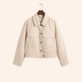 flat lay of cream jacket 