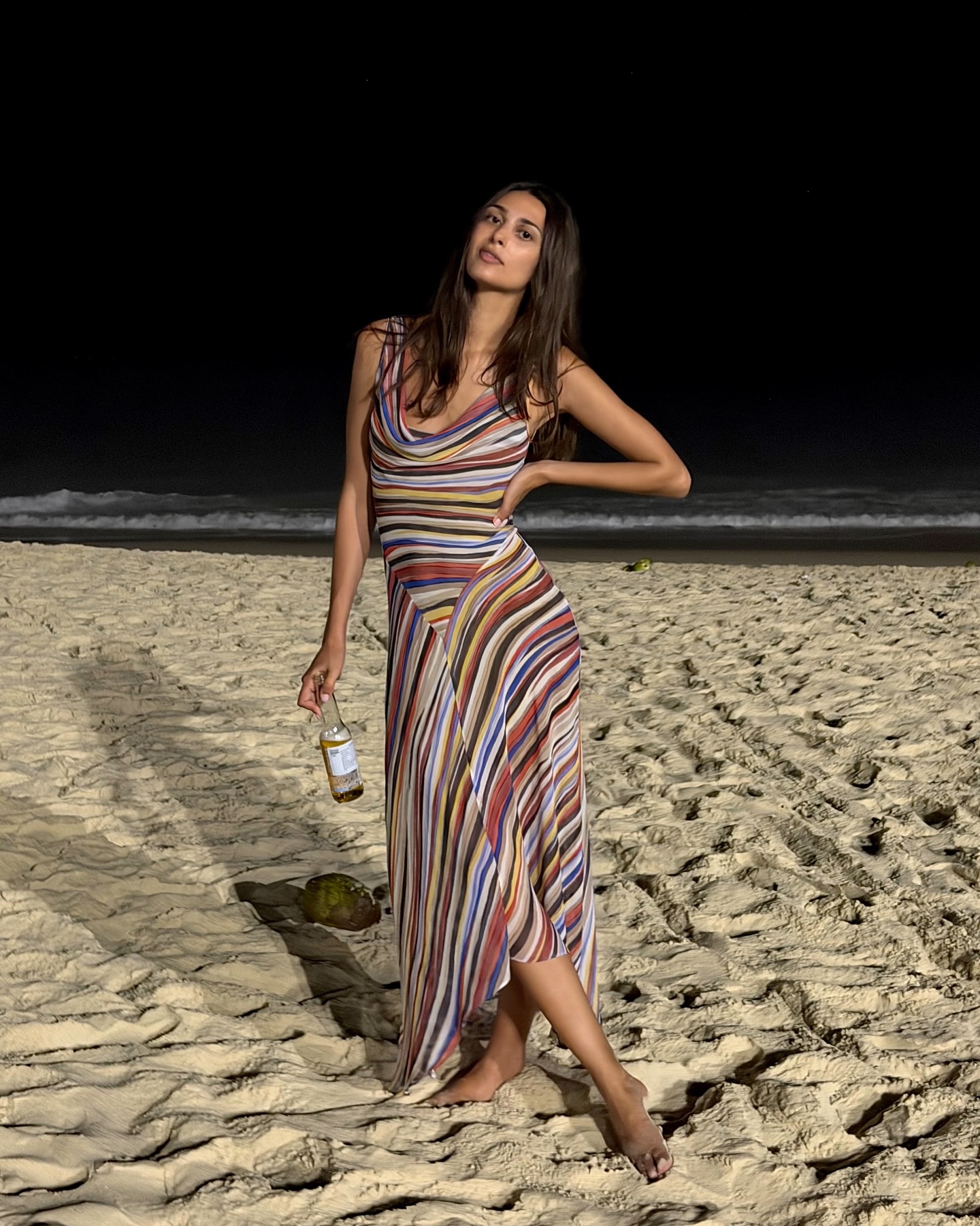 An image of a woman wearing striped dress for summer 2026