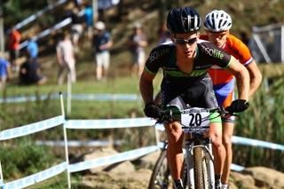 South Africa's James Reid put in his best effort ever to claim fourth position in the under 23 men's cross country race