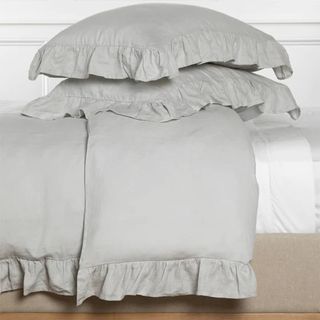 gray linen bedding set with ruffle edges
