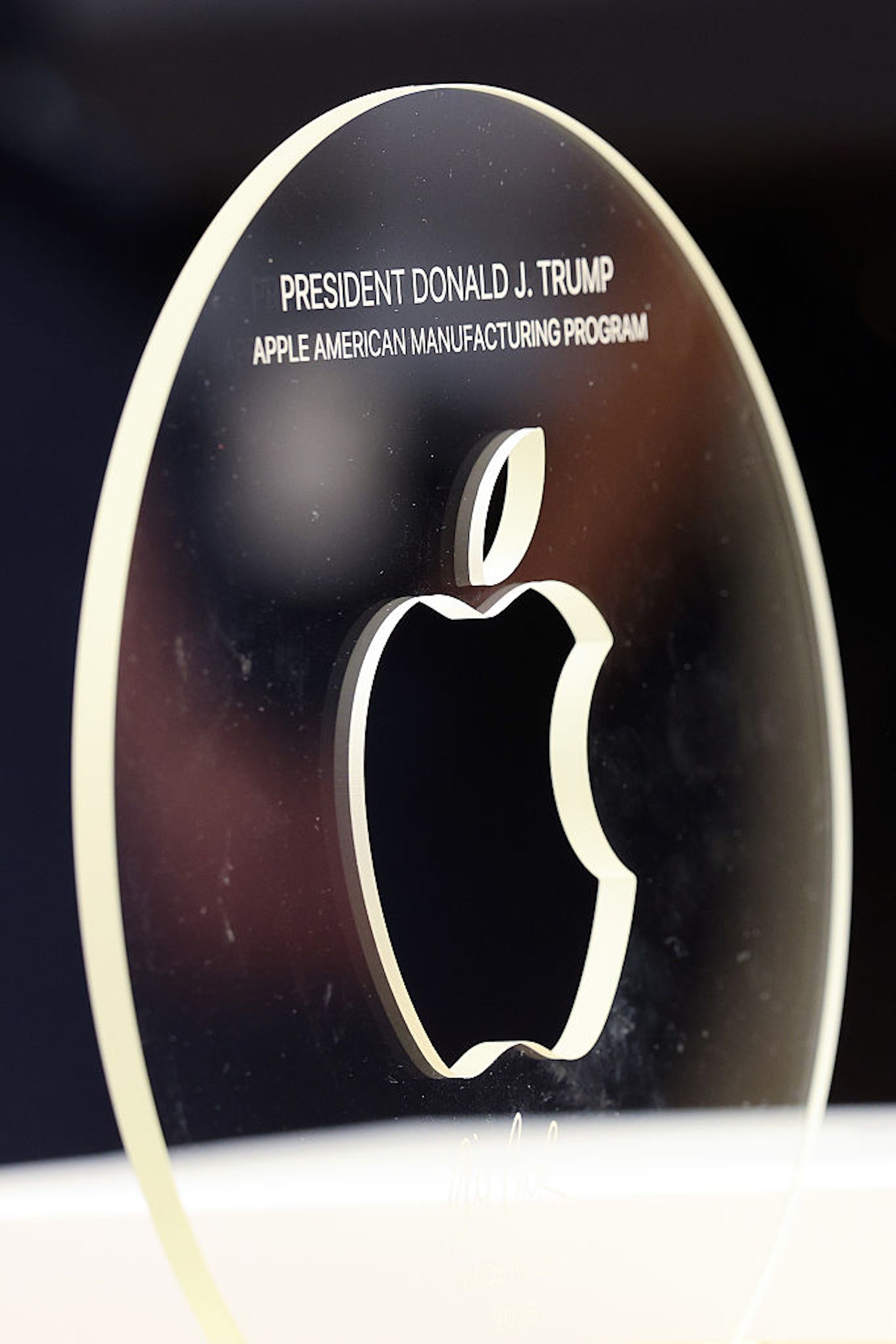 Tim Cook and Donald Trump at a White House press conference