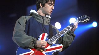 Noel Gallagher plays his Union Jack Epiphone in the 90s