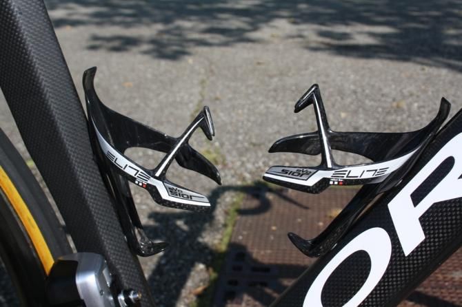 The pair of Elite Sior Evo bottle cages &ndash; a titanium skeleton wrapped in carbon &ndash; are robust drinks holders