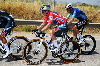 FUENTE DEL MAESTRE SPAIN AUGUST 21 Primoz Roglic of Slovenia and Team Red Bull Bora hansgrohe Red Leader Jersey competes during La Vuelta 79th Tour of Spain 2024 Stage 5 a 177km stage Fuente del Maestre to Seville UCIWT on August 21 2024 in Seville Spain Photo by Dario BelingheriGetty Images