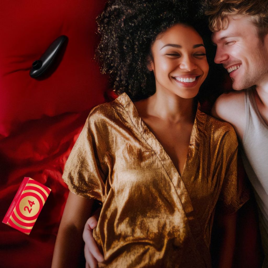 A couple pictured beside an item from the Lovehoney Couples Advent Calendar