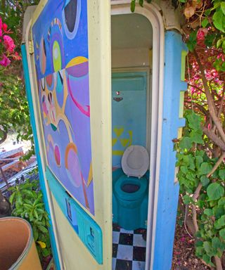 painted portable outdoor toilet