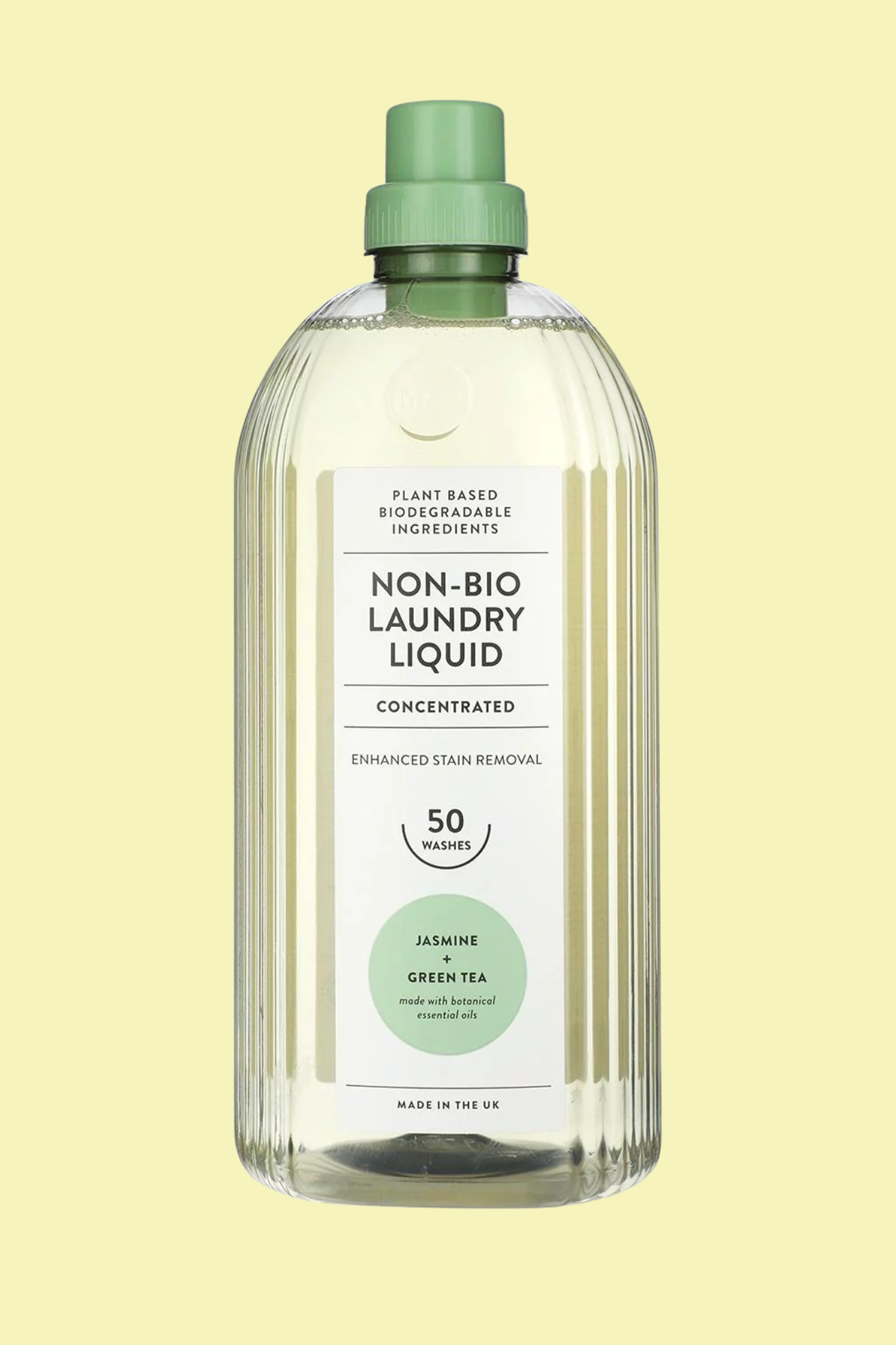 A bottle of laundry liquid against a light yellow background