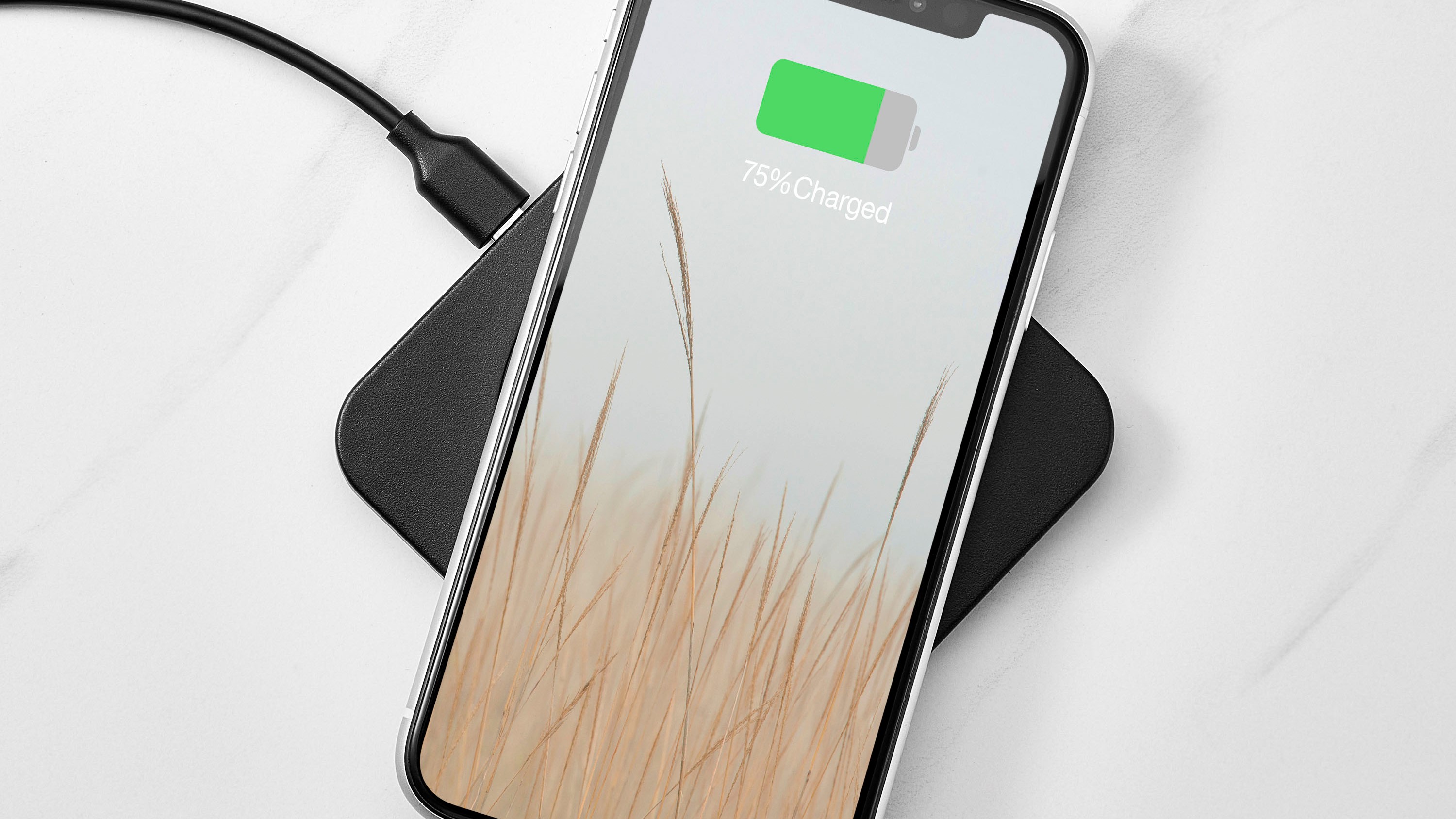 Insignia wireless charging pad in use