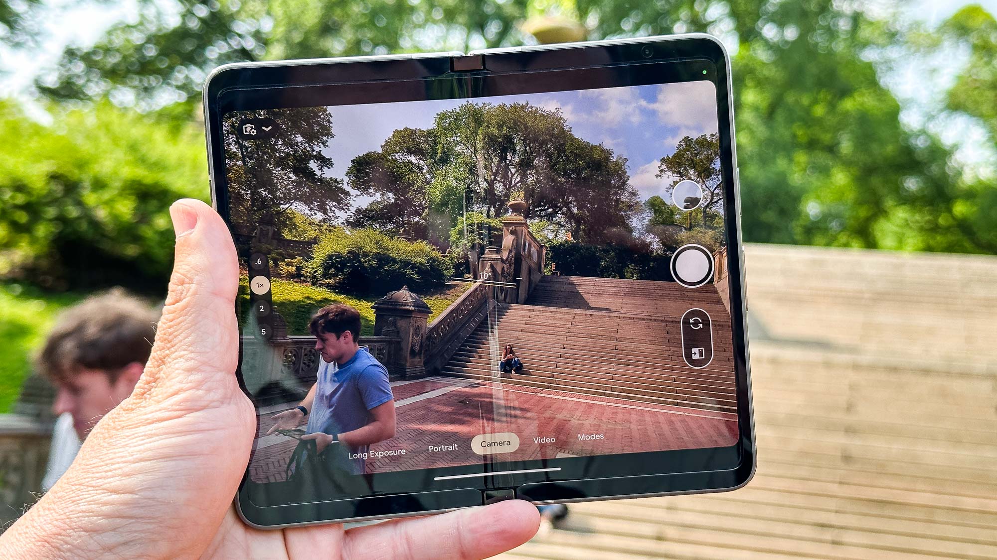 Google Pixel Fold shown in hand