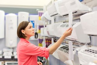 woman buys an air conditioner