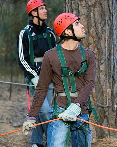 Jesse Anthony and Skyler Bishop focus on their belay duties