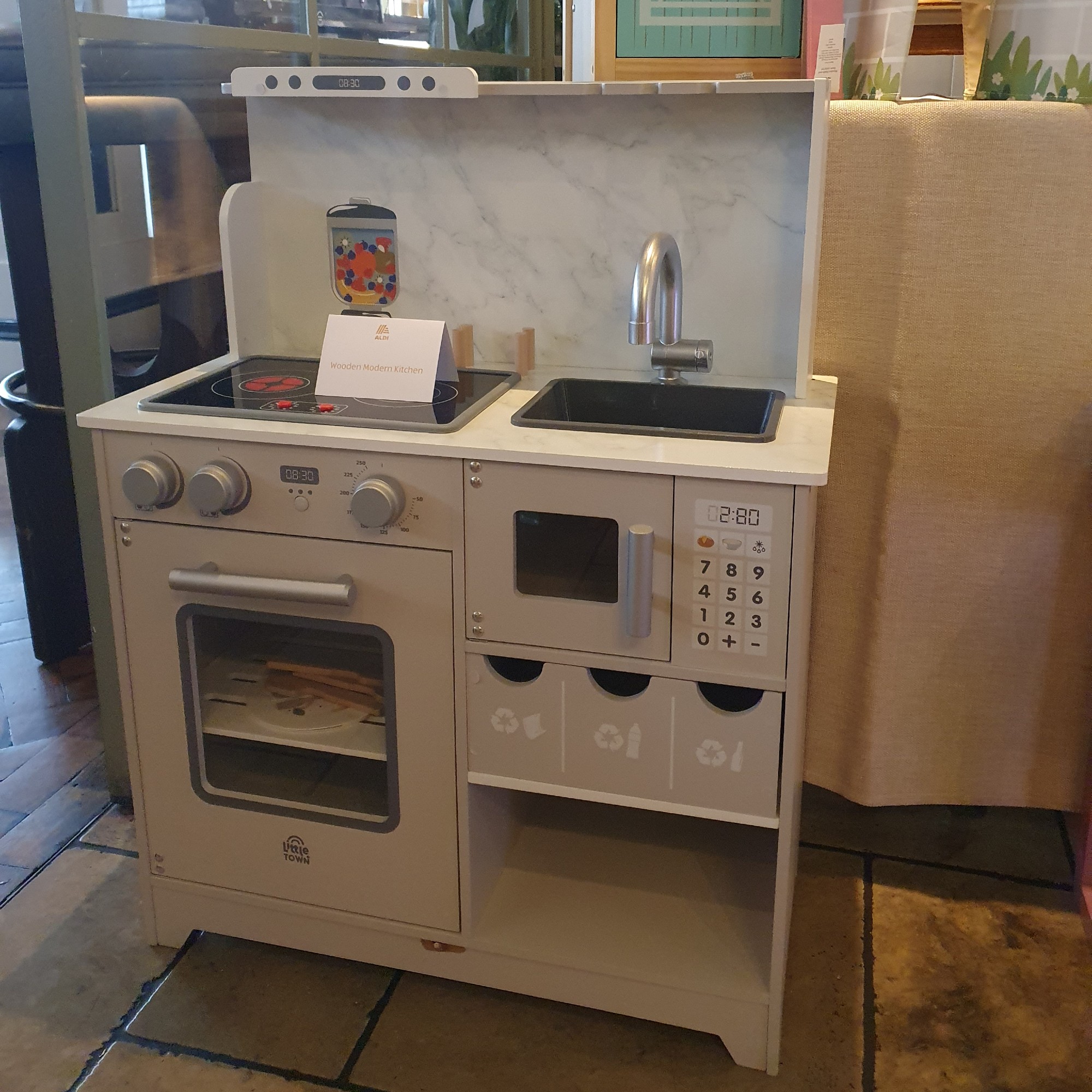 Aldi's wooden toy modern kitchen displayed at the retailer's Christmas press preview for 2026