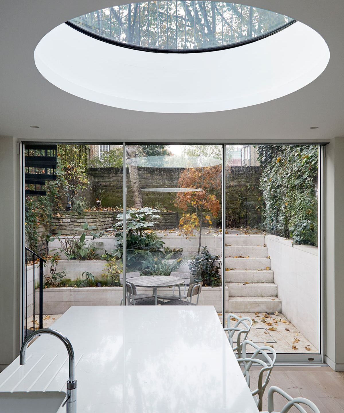 lower ground brick home extension with roof terrace