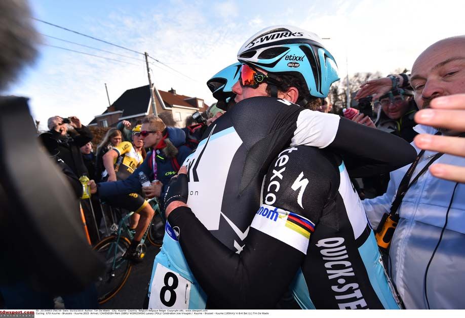Mark Cavendish hugs Lukazs Wisniowski after he wins Kuurne-Brussel-Kuurne