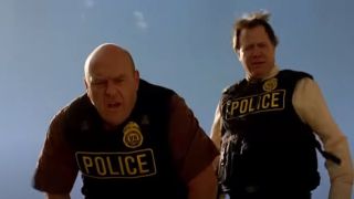 Two DEA agents including Hank looking down at Tortuga in Breaking Bad.