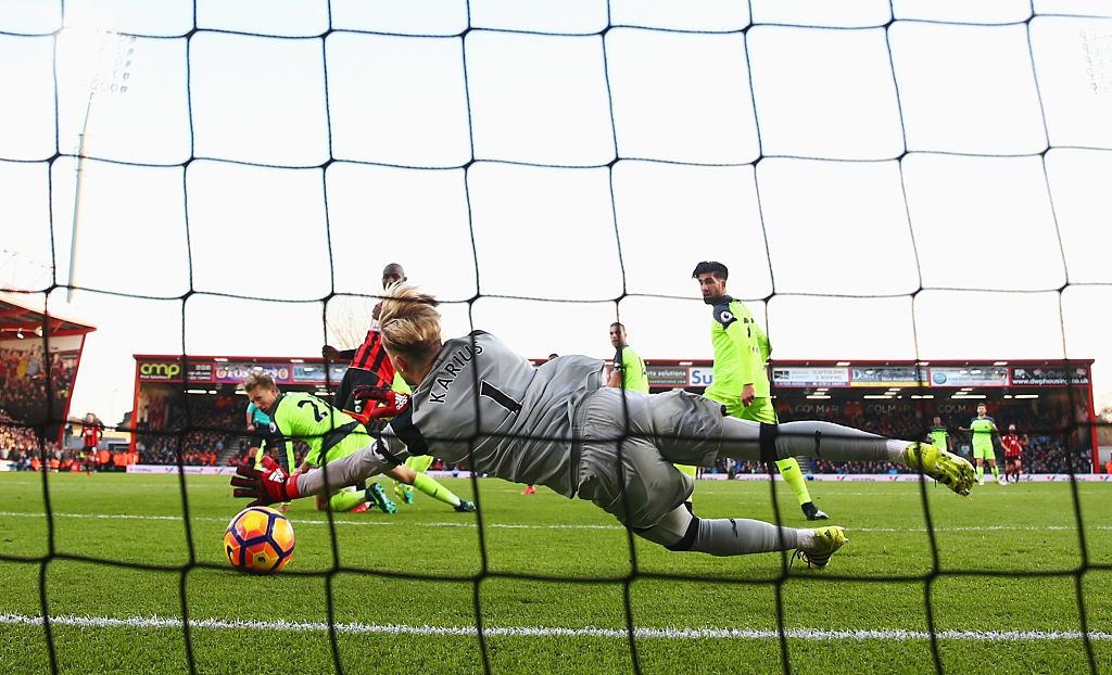 Loris Karius of Liverpool fails to stop Ryan Fraser of AFC Bournemouth (obscured) from scoring their second goalduring the Premier League match between AFC Bournemouth and Liverpool at Vitality Stadium on December 4, 2016 in Bournemouth, England.