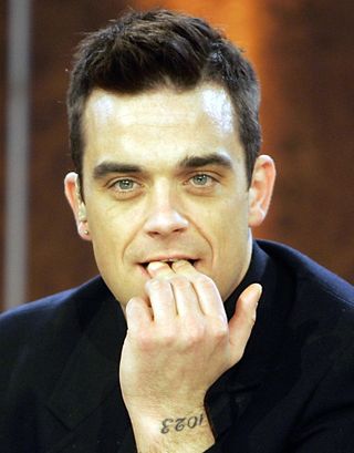 Robbie Williams wants to be in 'Celebrity' jungle