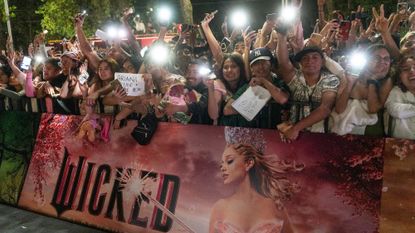 Fans line up ahead of a "Wicked: Part One" screening at the Auditorio Nacional in Mexico City