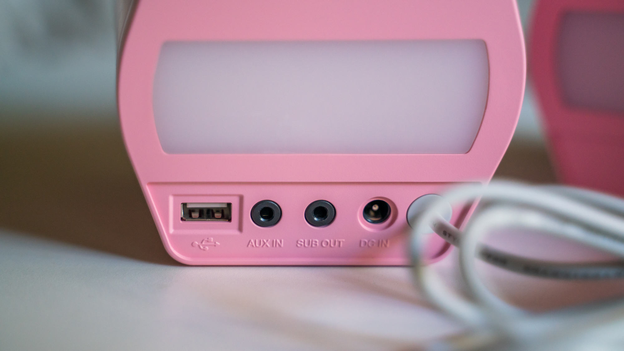 Edifier G2000 in pink on a table