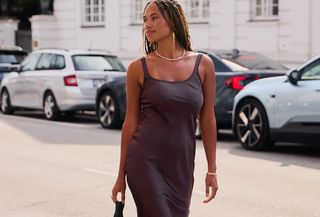 Woman in brown dress.