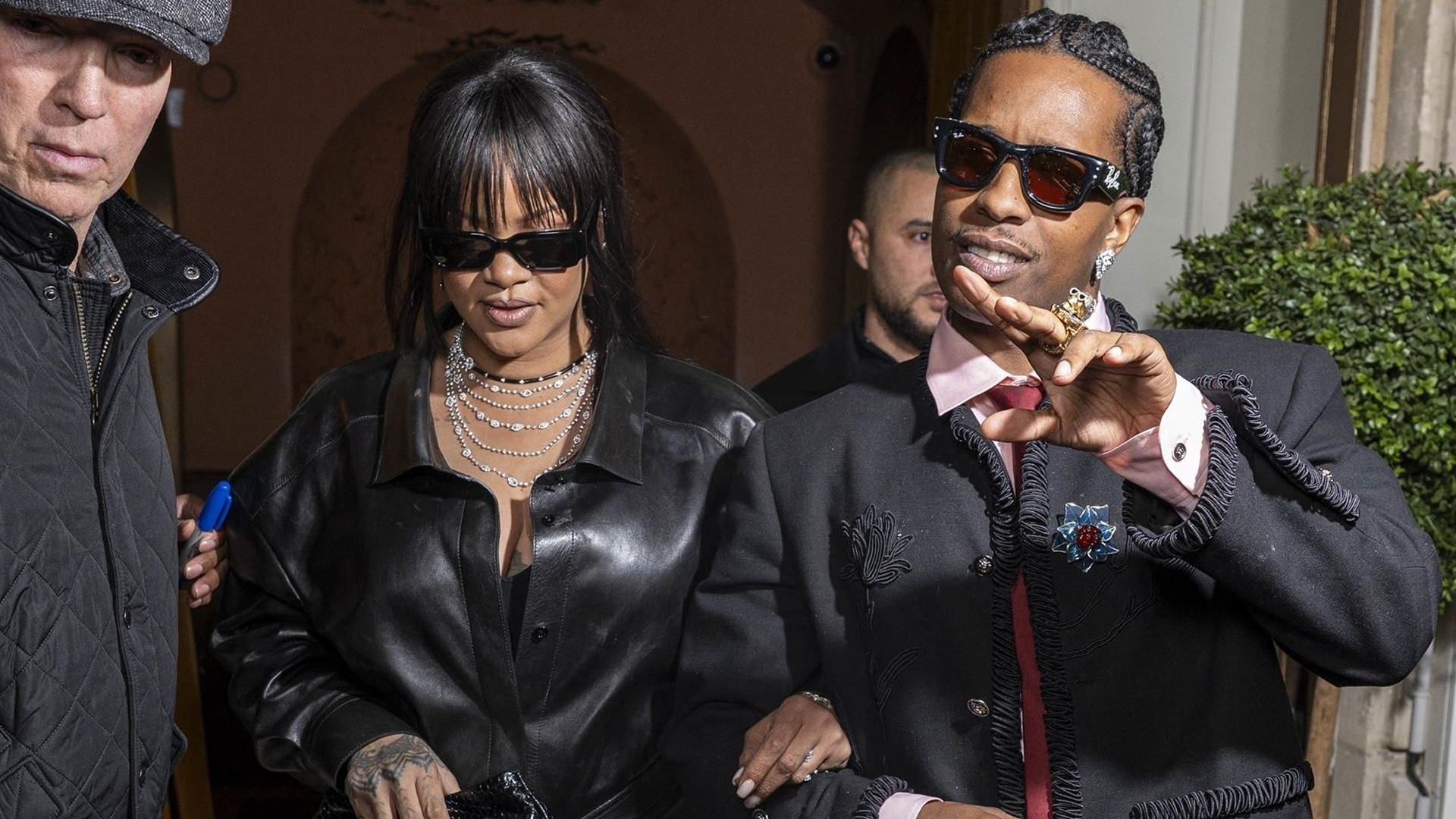 Rihanna was spotted in Paris with A$AP Rocky wearing a leather button-down and asymmetrical skirt from Givenchy