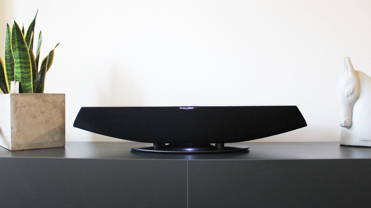 ThenSonus Faber Omnia viewed from the front directly, showing clearly its curved body and flat top.