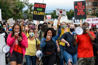 Protesters demand justice for Elijah McClain.
