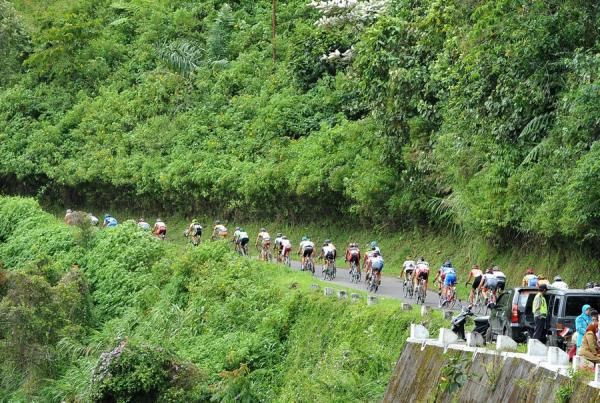 The riders ride at a fairly sharp climb