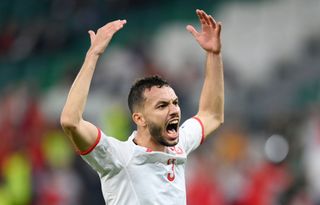Montassar Talbi of Tunisia gestures to the crowd during the FIFA World Cup Qatar 2022 Group D match between Denmark and Tunisia at Education City Stadium on November 22, 2022 in Al Rayyan, Qatar.