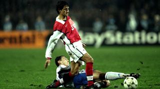 3 Nov 1998: Nelson Vivas of Arsenal is tackled by Yurii Dmytrulin of Dynamo Kiev during the Champions league match in Kiev, Ukraine. Dynamo Kiev won the game 3-1. \ Mandatory Credit: Alex Livesey /Allsport