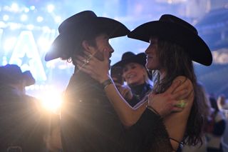 Adan Banuelos and Bella Hadid attend The American Performance Horseman by Teton Ridge at Globe Life Field on March 08, 2024