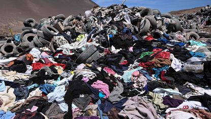 piles of old clothes in Atacama desert, Chile