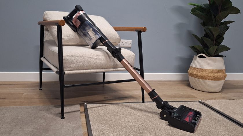 Shark Stratos IZ400 cordless vacuum in testing studio with floor samples