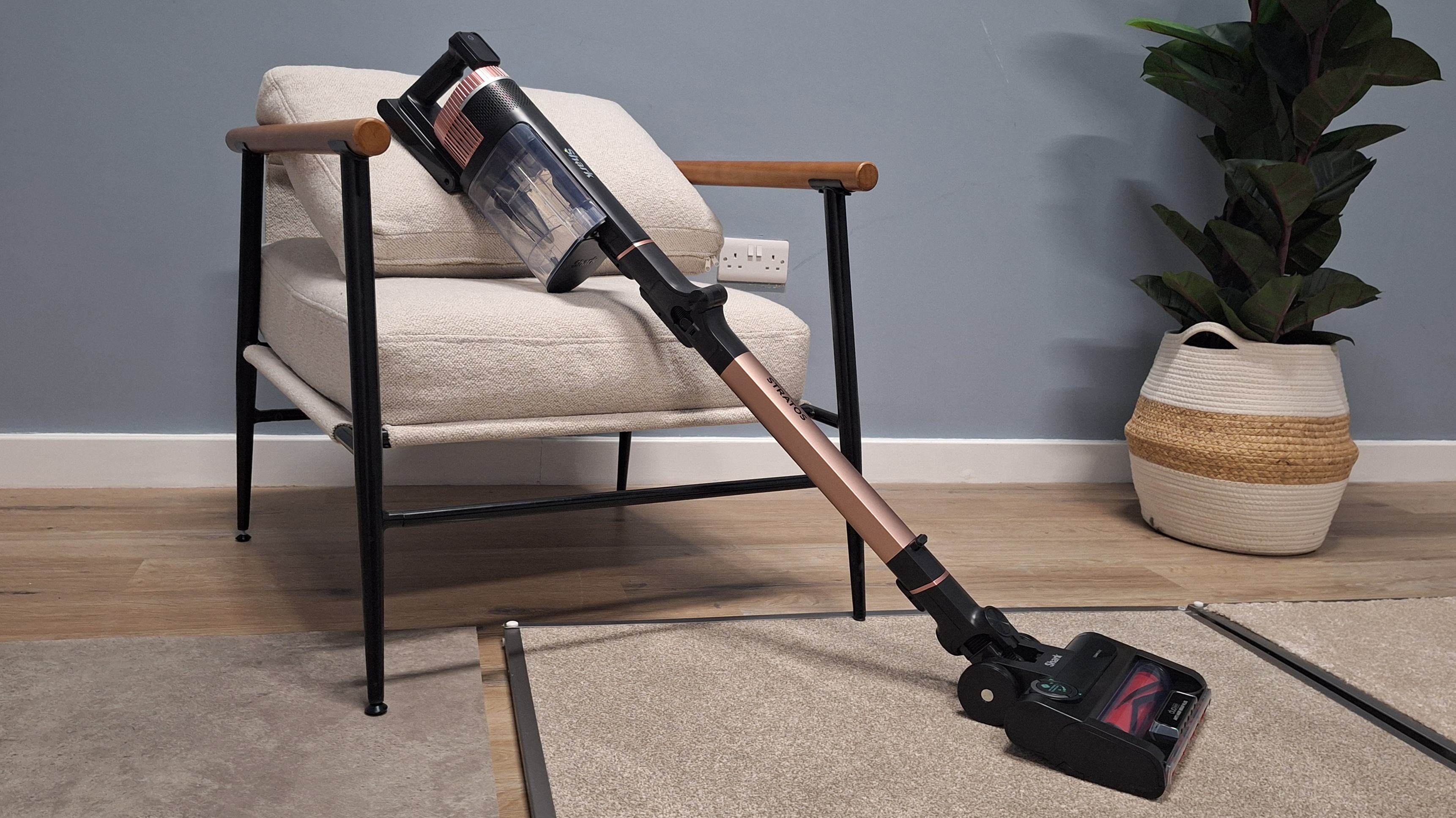 Shark Stratos IZ400 cordless vacuum in testing studio with floor samples