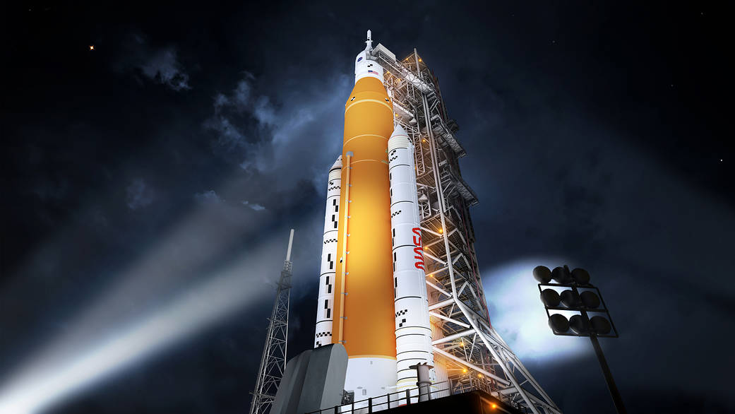 An illustration of NASA's Space Launch System (SLS) rocket lit up at night in its Block 1 crew vehicle configuration.