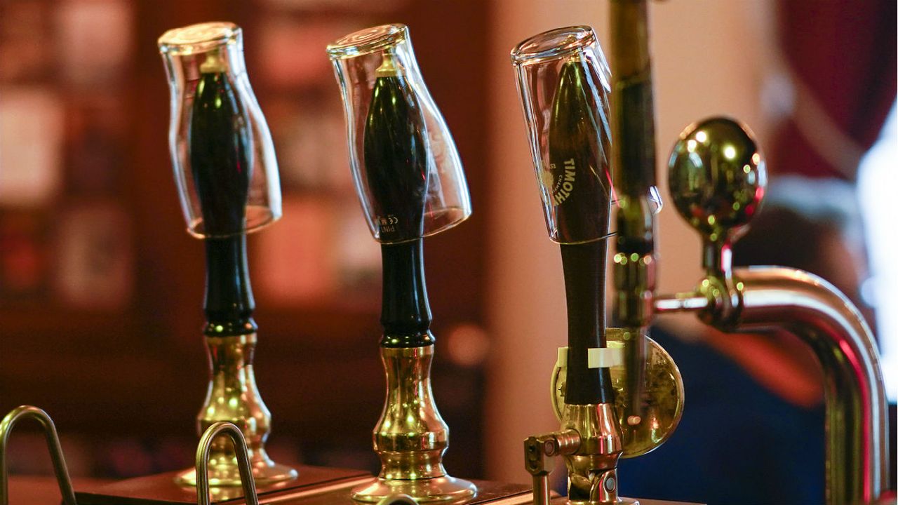 Beer pumps in a pub 