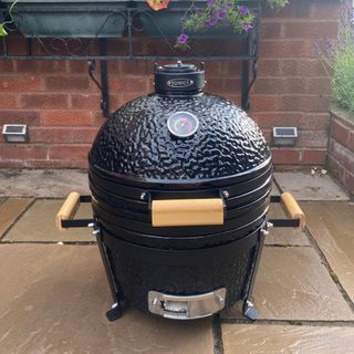 Kamado Maxi Ceramic Charcoal BBQ assembled in the rain on its stand