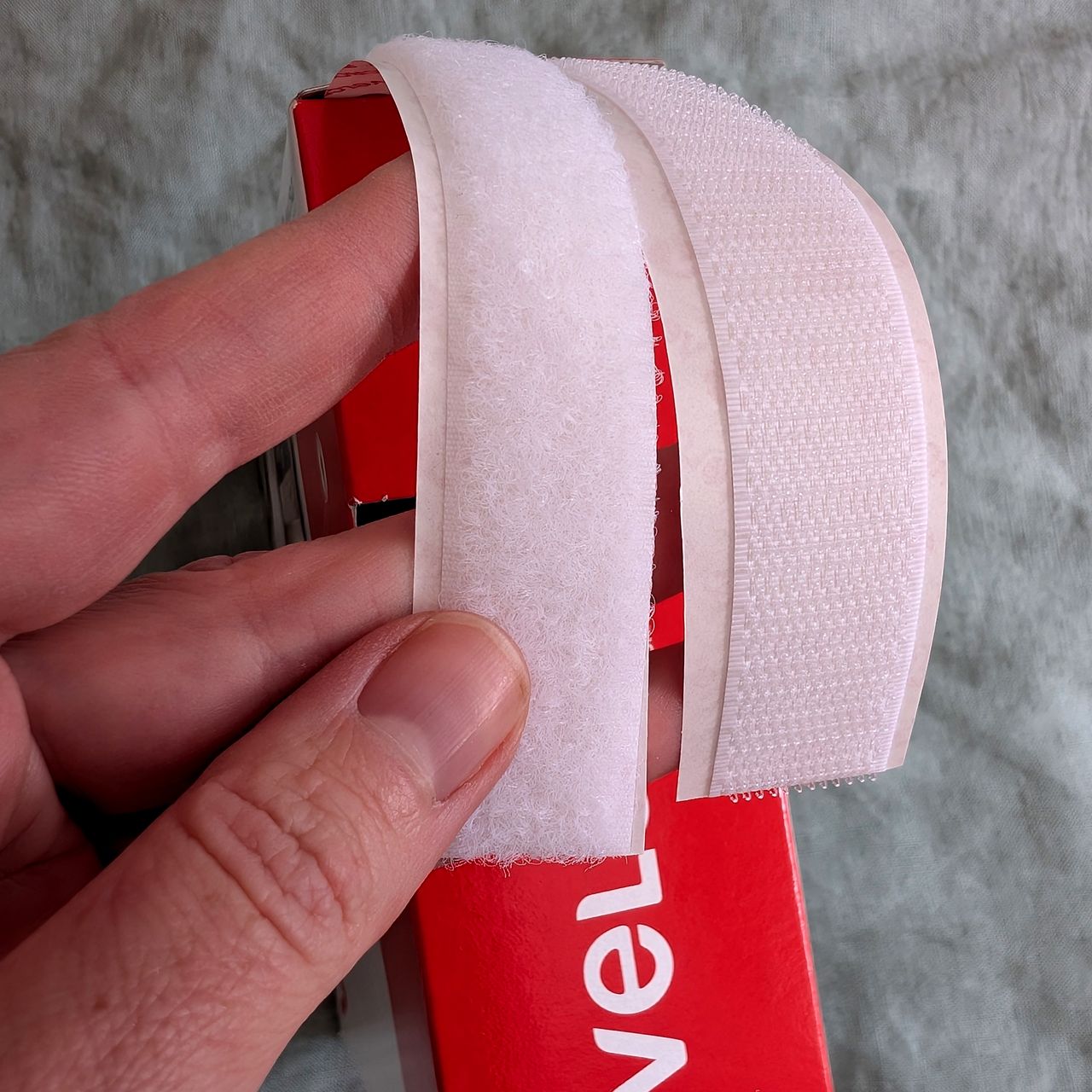 A DIY mosquito screen made with Velcro tape and fly mesh cut to size
