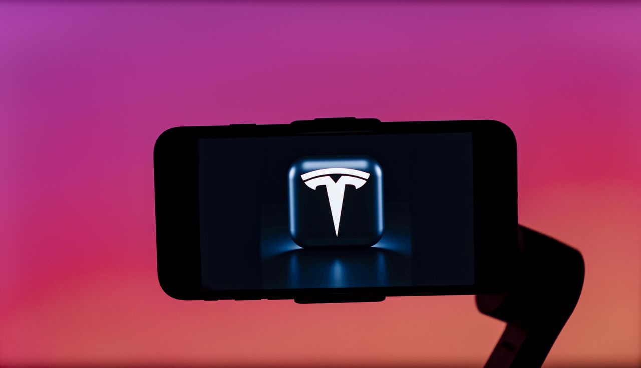 Tesla logo on a phone