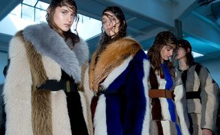 Female models dressed in the Marni A/W 2014 backstage of the fashion show
