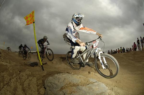 Max Hughes leads the field into turn one.